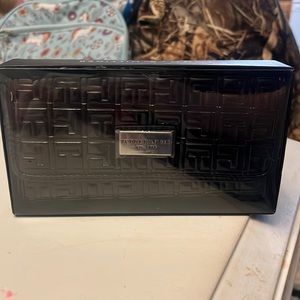 Tommy Hilfiger Wallet. New inside box, never taken out. Original price $58